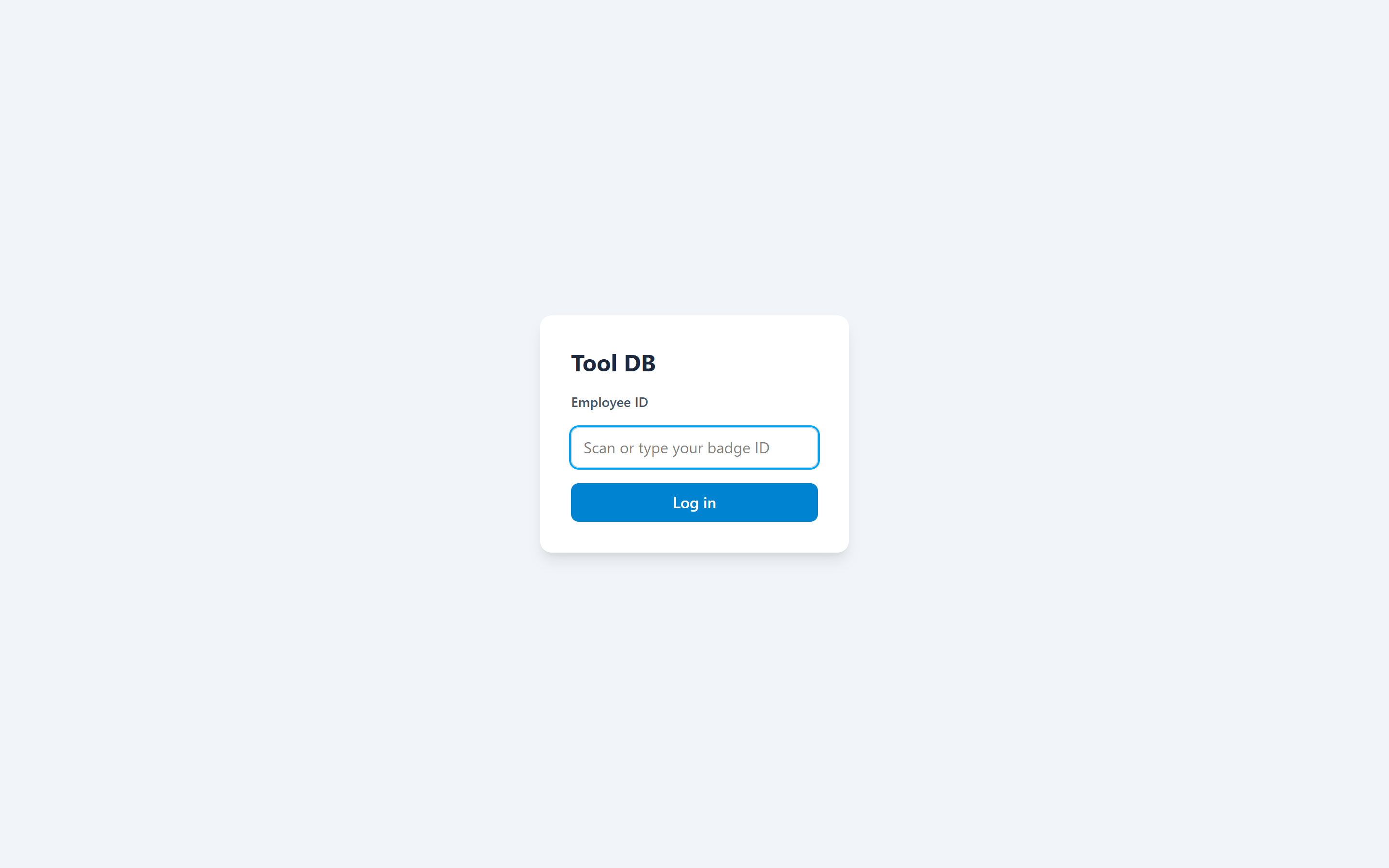 Login screen: scan or type a badge ID — no password field